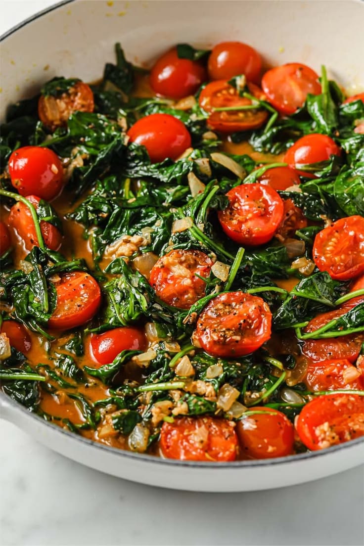 Sautéed Spinach + Confit Garlic & Tomato